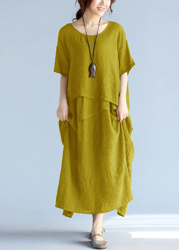 Gray linen cotton maxi dress by FJØRNA, casual wedding dress with flowing fabric and relaxed fit, suitable for summer occasions.