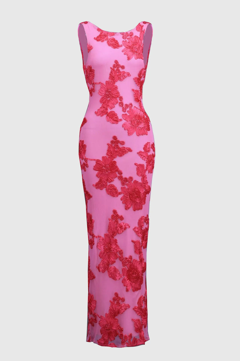 FJØRNA floral sleeveless elegant maxi dress for women, flowing fabric with a vibrant floral pattern and fitted waist.
