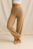 FJØRNA women's stylish cashmere joggers pants, soft and comfortable for casual wear, shown in a relaxed fit.