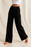 FJØRNA women's cashmere joggers, elegant women's pants in soft fabric, casual yet stylish for comfortable wear.
