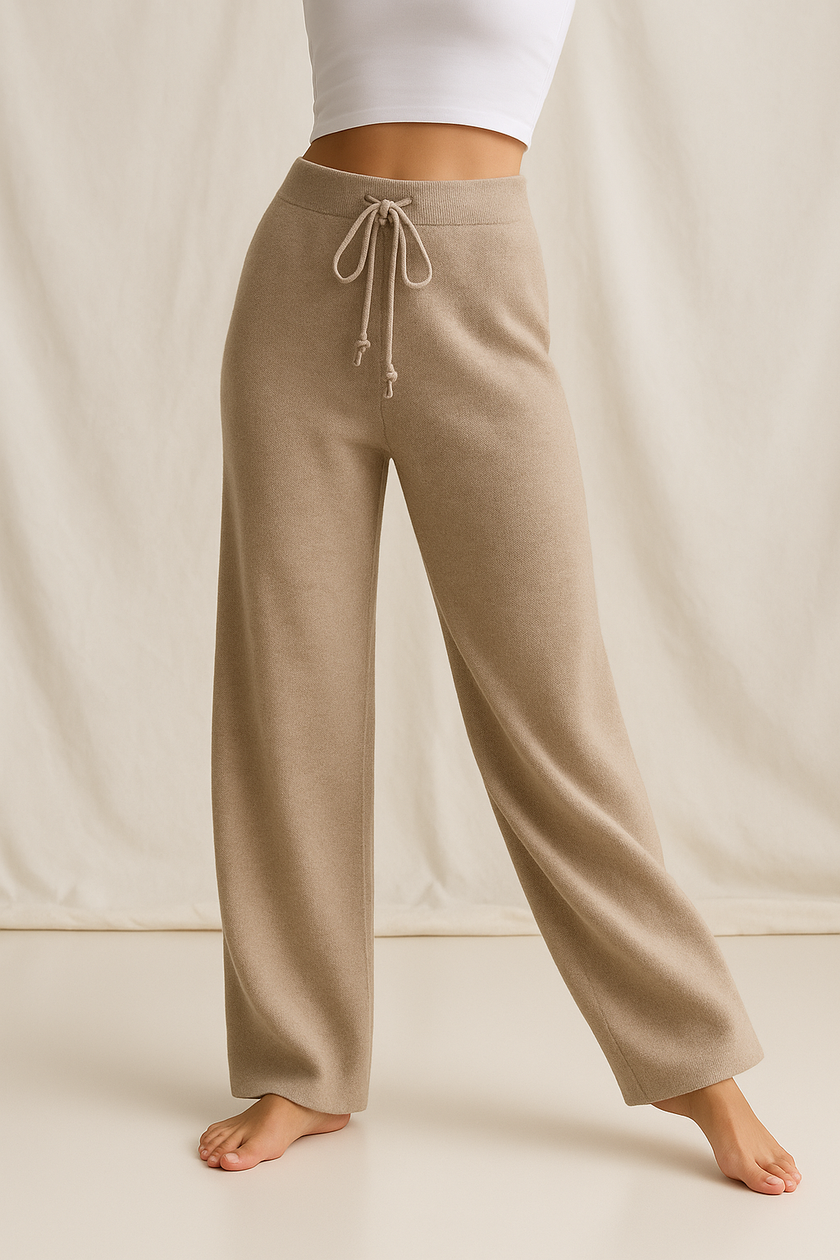FJØRNA women's joggers, stylish and comfortable casual pants in soft cashmere fabric, shown in a relaxed fit.