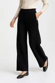 FJØRNA women's joggers in cozy cashmere pants, soft fabric, relaxed fit, and stylish design shown in the image.