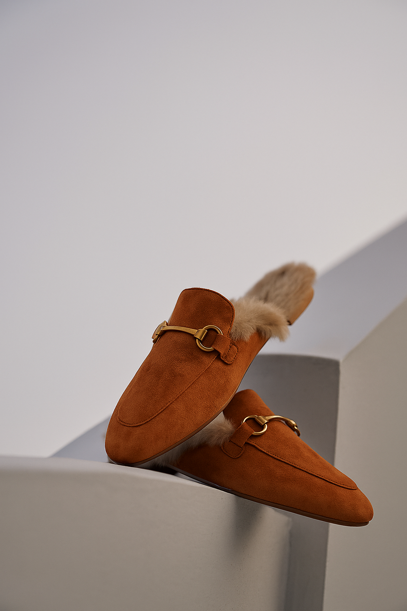 FJØRNA women's fur mule slippers with plush lining, slip-on luxury shoes featuring elegant design and cozy fur detail.