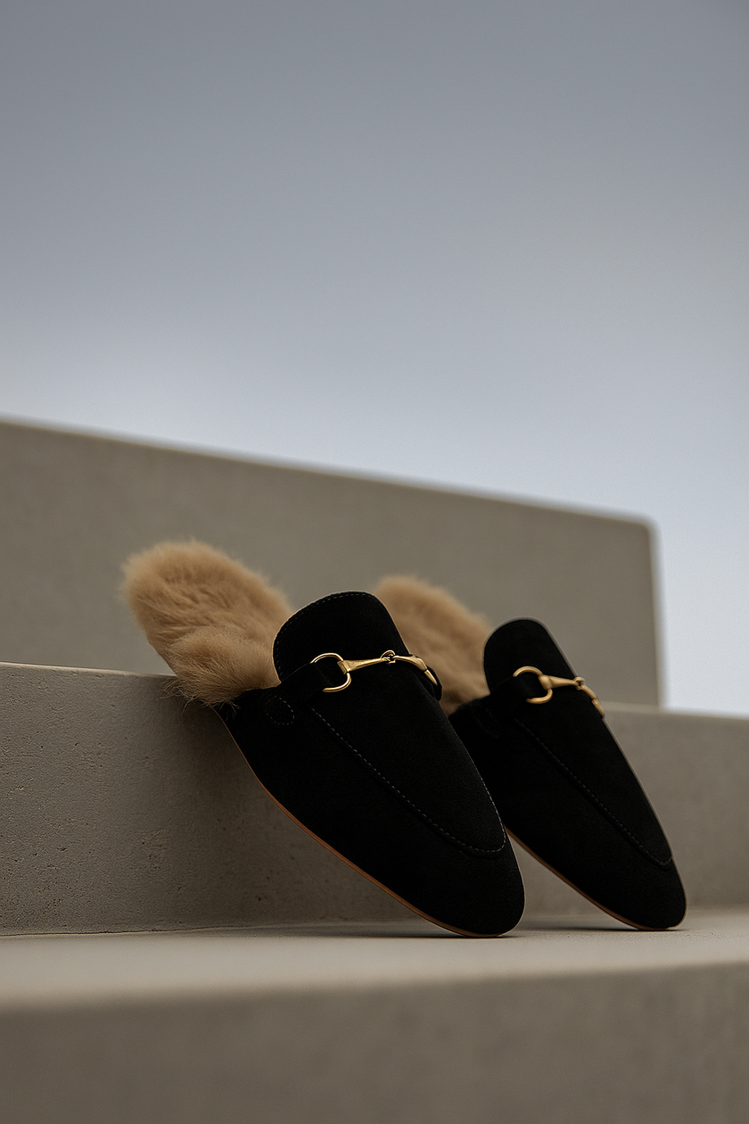 FJØRNA women's fur mule slippers with plush lining and slip-on design, featuring elegant luxurious fur details.
