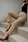 FJØRNA wool blend high waist tapered trousers for women, showcasing a stylish and comfortable pant design.