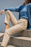 FJØRNA wool blend high waist tapered women’s pants with a tailored fit, shown in a chic, neutral-toned design.