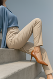 FJØRNA wool blend women's high waist tapered trousers, stylish and comfortable pants with a modern fit, shown in the image.