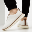 FJØRNA men's knit mesh trainers with breathable waffle pod cushioning and sleek white design, ideal for comfortable everyday wear.