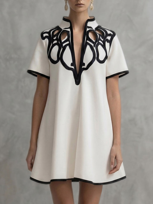 FJØRNA white A-line V-neck mini dress with loose fit and contrast color details, stylish and casual for everyday wear.