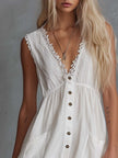 White lace V-neck mini dress by FJØRNA, casual dress with delicate lace details and a fitted V-neck design.