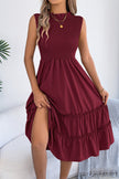 FJØRNA sleeveless midi dress with solid color, tucked patchwork design, casual style, and relaxed fit.