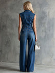 Blue washed denim sleeveless jumpsuit for women with a collared neckline, by FJØRNA, featuring a fitted waist and casual style.