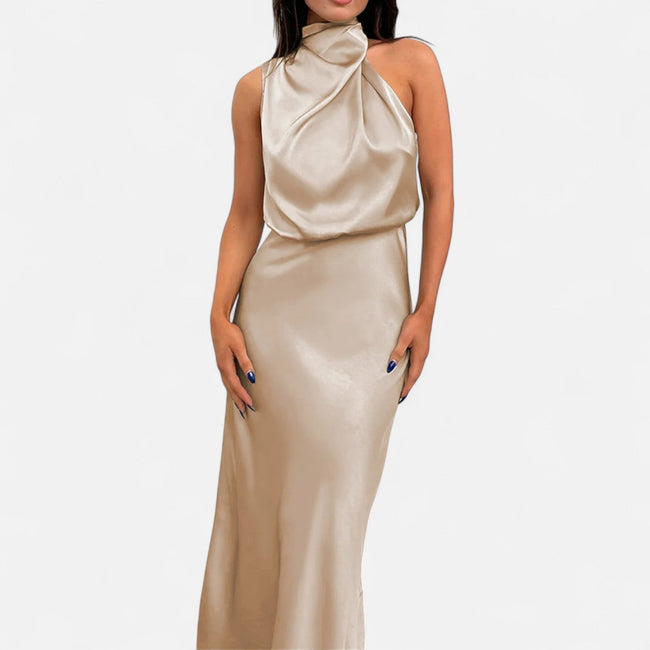 FJØRNA draped sleeveless halter maxi dress with flowing fabric and elegant design, perfect for summer occasions.