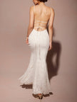 Three-dimensional burnt fishtail women's maxi dress by FJØRNA featuring a flowing summer dress with layered fabric and a fitted waist.