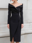 FJØRNA black off-shoulder structured midi dress with overlapping front slit, perfect for elegant women's evening wear.