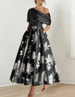 White satin midi dress for women, off-shoulder bodycon style with printed design by FJØRNA.