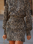 FJØRNA leopard print long-sleeve tailored mini dress featuring a fitted silhouette and stylish design.