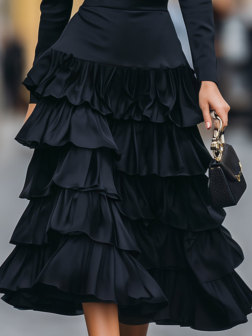 FJØRNA elegant mock neck tiered ruffle midi dress for women, featuring layered ruffles and a sophisticated design.