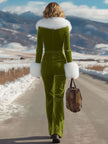 Rose red velvet faux fur collar jumpsuit by FJØRNA featuring flared legs and a fitted bodice, shown on a model.