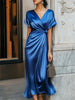 FJØRNA draped maxi dress with ruched V-neck and raglan sleeves, flowing elegant style perfect for summer or special occasions.