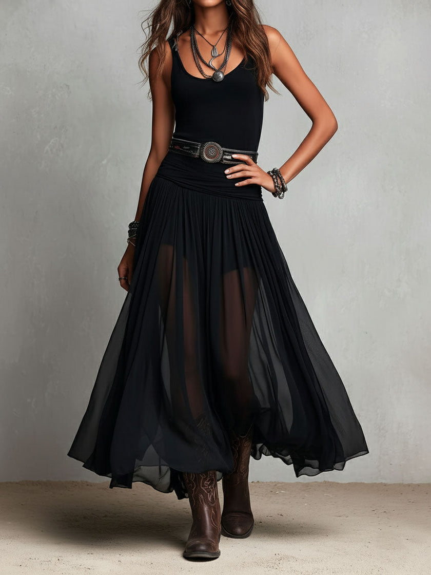 FJØRNA black maxi dress, casual style with flowing fabric and sleeveless design, perfect for summer or everyday wear