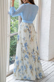 FJØRNA plant print V-neck long sleeve maxi dress with elegant stitching, flowing design, and floral pattern.