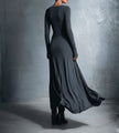 Flowy FJØRNA summer maxi dress for women with wrap style and floral pattern, ideal for warm weather and casual occasions.