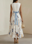 FJØRNA women's white printed V-neck sleeveless dress with pleated design, perfect for stylish summer fashion.
