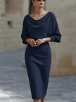 White FJØRNA fashionable dress with bat sleeves and waist-cinching design, elegant and stylish for various occasions.
