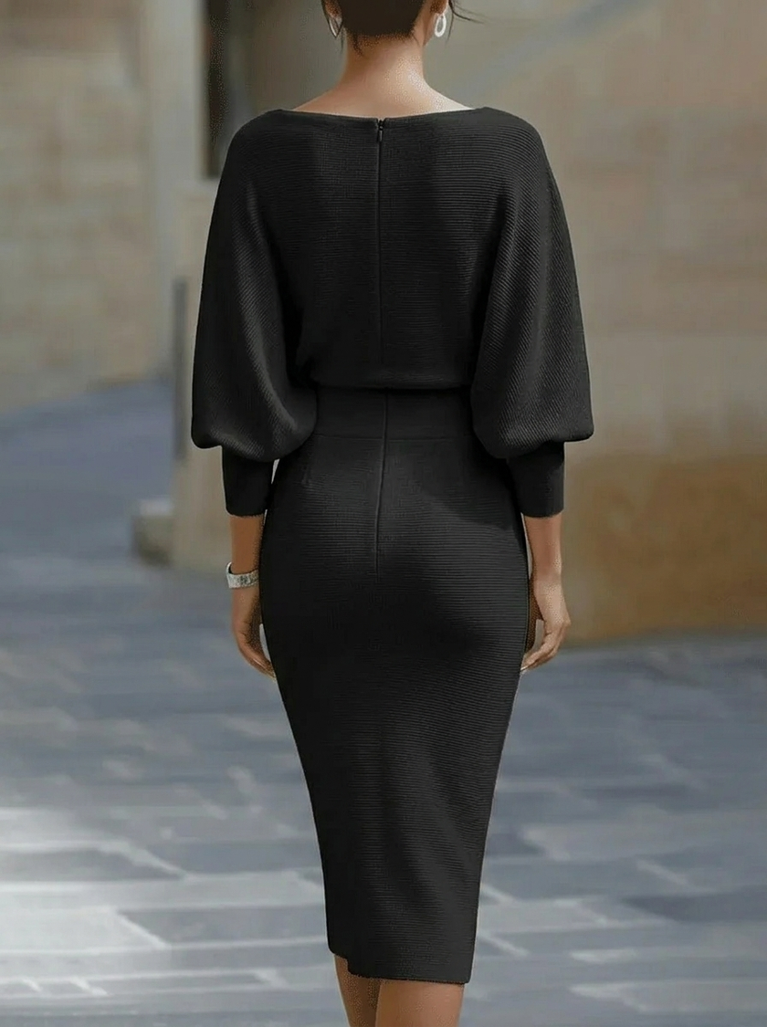 White FJØRNA dress with bat sleeve design, waist-cinching silhouette, elegant and fashionable for stylish occasions.