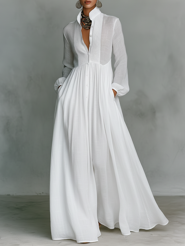 White FJØRNA stand collar button long sleeve maxi dress featuring a flowing silhouette and elegant design.