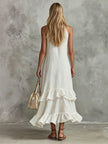 White sleeveless cotton-linen midi dress with ruffled details, retro-elegant style by FJØRNA for women.