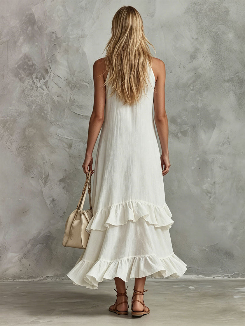 White sleeveless cotton-linen midi dress with ruffled details, retro-elegant style by FJØRNA for women.