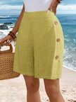 FJØRNA women's lightweight summer shorts with relaxed fit, elastic waist, and breathable fabric, shown on a model.