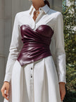 FJØRNA white shirt dress with wine-red sculpted leather corset, structured two-piece dress, elegant and modern fashion look