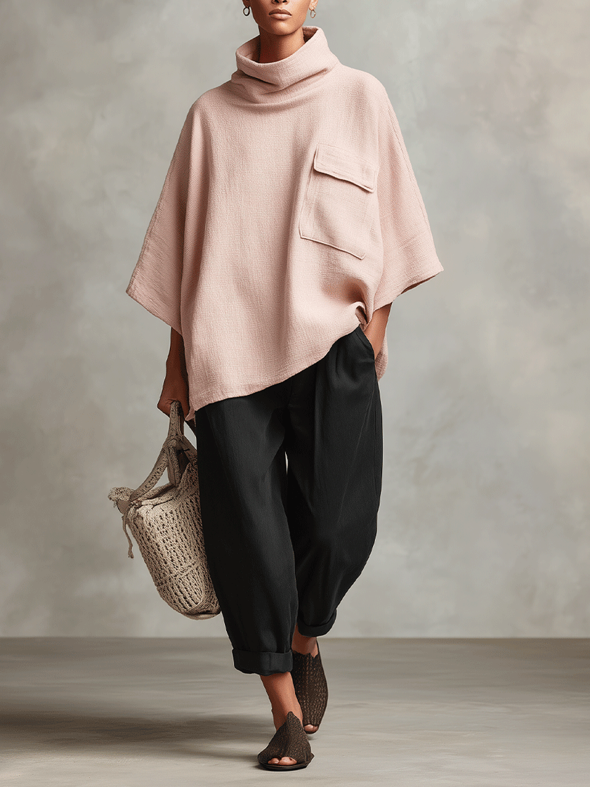 FJØRNA lightweight summer tapered ankle-length trousers for women, showing a relaxed fit in breathable fabric.