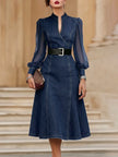 FJØRNA stylish denim dress with organza sleeve panels, featuring a fitted silhouette and elegant short sleeves.