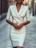 FJØRNA white tailored blazer dress with belt, featuring a sleek fit and classic design for women, styled on a mannequin.