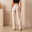 FJØRNA women's straight leg trousers, stylish and comfortable pants with a tailored fit, shown in a neutral color.