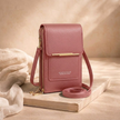 FJØRNA women's anti-theft travel crossbody bag with secure zippers and compact design, ideal for travel and everyday use.