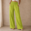 Women’s linen blend wide-leg trousers by FJØRNA with elastic waist and relaxed fit, perfect for casual and comfortable style.