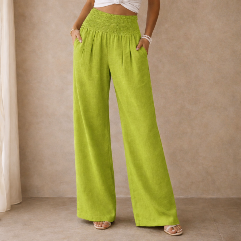 Women’s linen blend wide-leg trousers by FJØRNA with elastic waist and relaxed fit, perfect for casual and comfortable style.