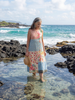 FJØRNA summer midi dress for women with floral pattern, short sleeves, flowy fit, perfect for warm weather.
