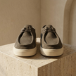 FJØRNA men's suede lace-up loafers showing classic slip-on design with soft suede material and stylish stitching details.