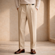 Men’s FJØRNA smart casual trousers with a tailored fit, showing stretch fabric and classic design in a neutral color.