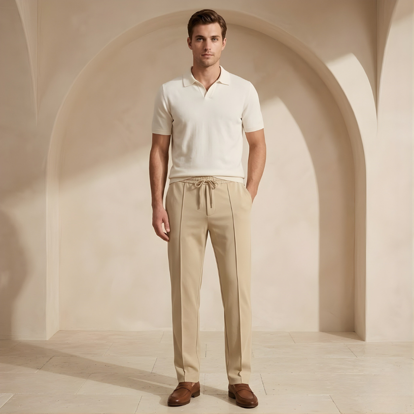 FJØRNA men's straight leg trousers with drawstring waist, relaxed fit, made of comfortable fabric, shown in a neutral color.
