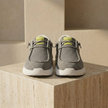 Men's breathable mesh walking shoes by FJØRNA with air cushion sole, designed for comfort and support during walks.