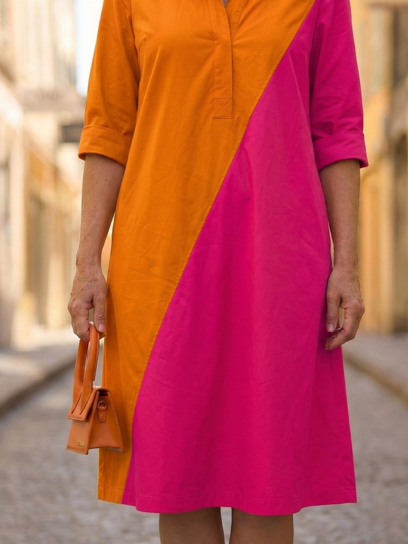 Flowy summer dress for women with pockets by FJØRNA, featuring a lightweight, breezy design perfect for warm weather.
