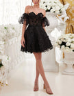 Black tulle cocktail dress for women with floral puff sleeves by FJØRNA, featuring a stylish and elegant design.