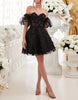 Black tulle cocktail dress for women with floral puff sleeves by FJØRNA, featuring a stylish and elegant design.